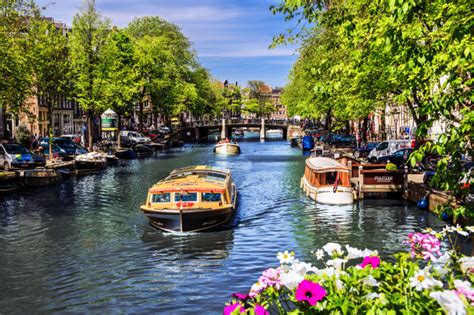 Eunsol's Enchanted Escape: A Whimsical Journey Through Amsterdam's Canals